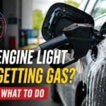 Check engine light after getting gas with fuel nozzle inserted into car at gas station