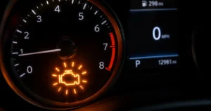 Flashing check engine light illuminated on a modern car dashboard, indicating a serious engine or emissions system fault requiring immediate attention.
