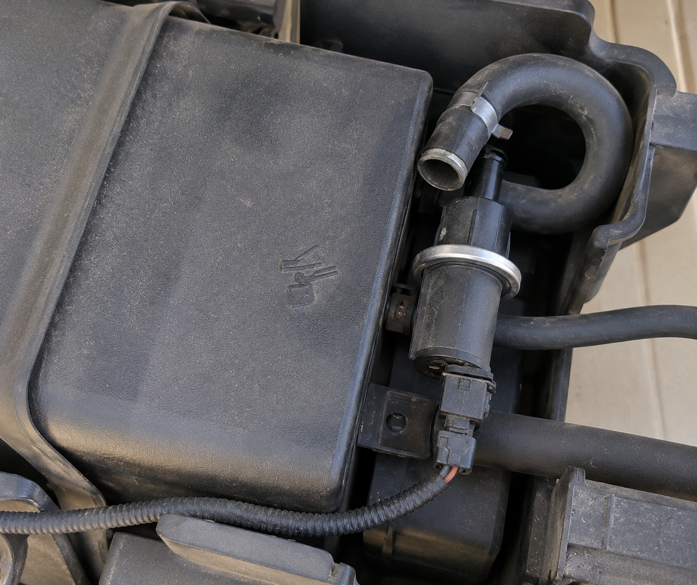 EVAP system component and vapor hose used to control fuel vapors after refueling