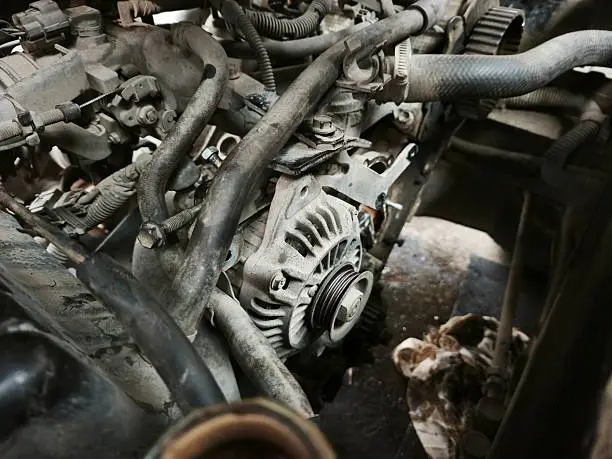 Failing car alternator causing the battery warning light to illuminate due to a charging system failure