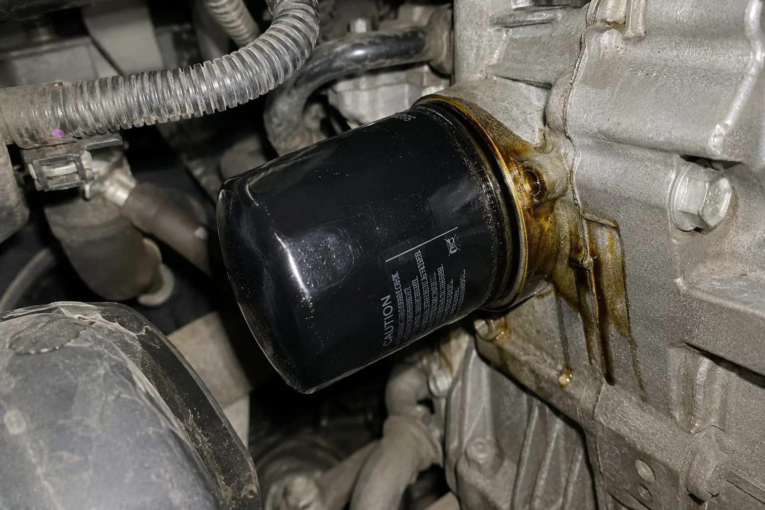 Incorrectly installed engine oil filter leaking oil after an oil change