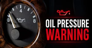 Oil pressure warning light illuminated on a car dashboard indicating low engine oil pressure and a potential engine lubrication problem.